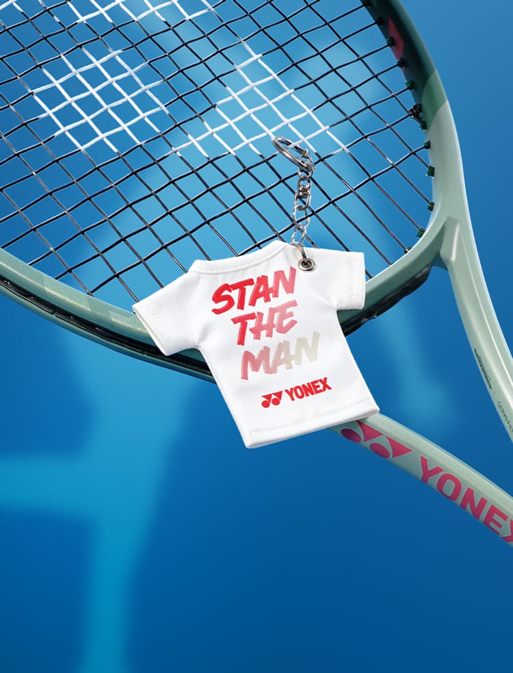 Stan the Man mini tee keyring hanging from a racquet